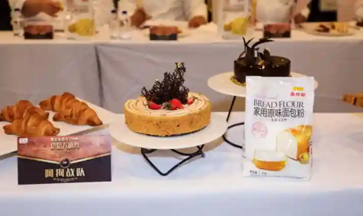 金龙鱼烘焙粉，携手米其林星厨，实力打造“冠军门徒”——金龙鱼精英100%烘焙大师赛迎来巅峰之战